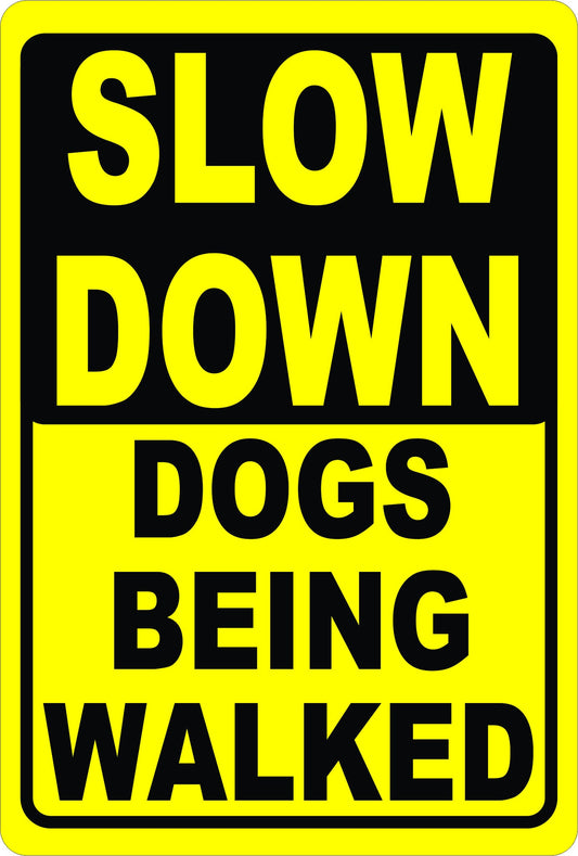 Slow Down Dogs Being Walked Sign
