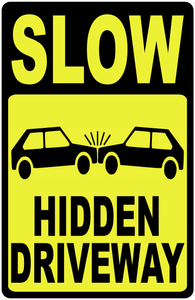 Slow Hidden Driveway Sign English and Spanish