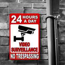 24 Hour a Day Video Surveillance in Use No Trespassing Sign