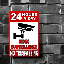 24 Hour a Day Video Surveillance in Use No Trespassing Sign