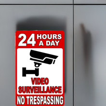 24 Hour a Day Video Surveillance in Use No Trespassing Sign