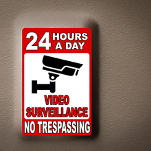 24 Hour a Day Video Surveillance in Use No Trespassing Sign