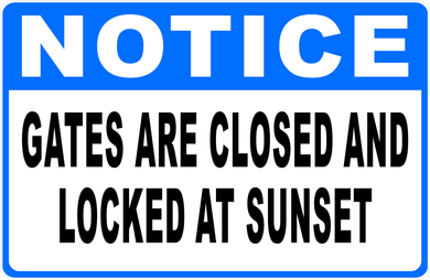 Notice Gates Are Closed And Locked At Sunset Sign