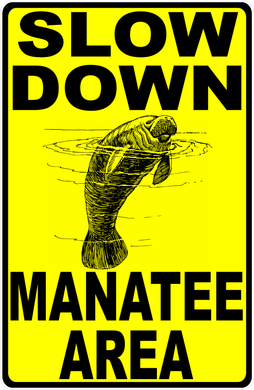 Slow Down Manatees Sign